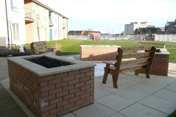 Raised Beds & Patio Area