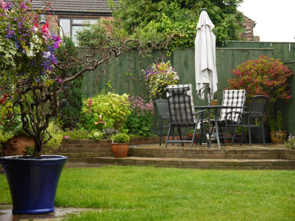 landscape design, landscaping, turfing, decking, lawn, circular patio, steps, decked area, timber decking, soft landscaping, hard landscaping, Green Onion Landscaping, hanging baskets, fencing, close board fence ,