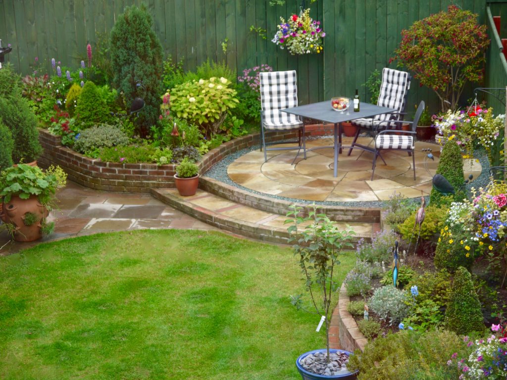 Patios,Paving,Raised Sandstone Patio,Steps,Garden Design,Landscapers, Teesside,Darlington,Middlesbrough, Fairfield, County Durham, North Yorkshire, landscape design, circular patio, 3 ring patio,