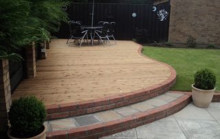 Curved Decking, Decking, Brick wall, steps, sandstone paving, Ingleby Barwick, Green Onion Landscaping,Landscapers, decking specialists