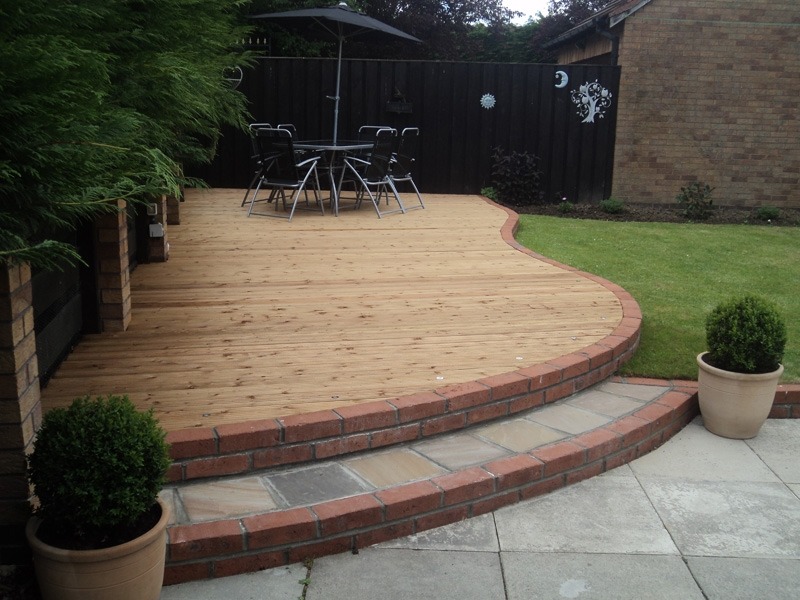 Curved Decking, Decking, Brick wall, steps, sandstone paving, Ingleby Barwick, Green Onion Landscaping,Landscapers, decking specialists
