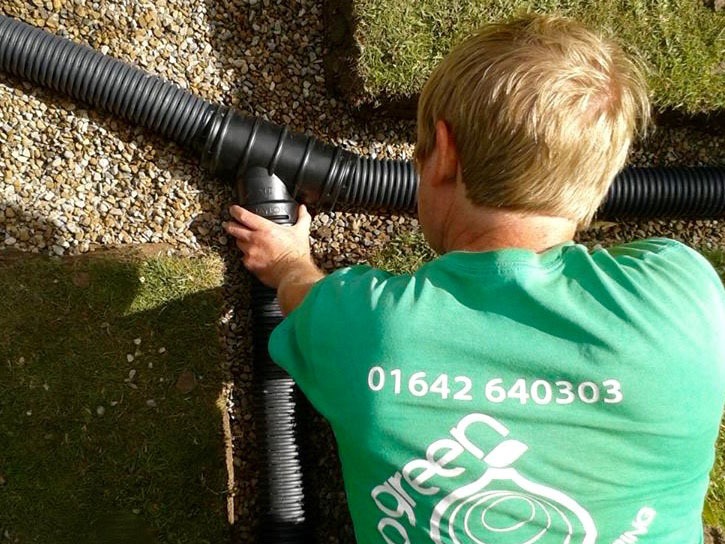 Garden drainage solutions, drainage, land drains, flood drains, sump holes, drainage pipes, under ground, lawn, flooding, soggy lawn, water holding, french drain system, spider network system, water logged lawn, Green Onion landscaping, Stockton, Teesside, County Durham, North east, North Yorkshire,solving garden drainage problems 