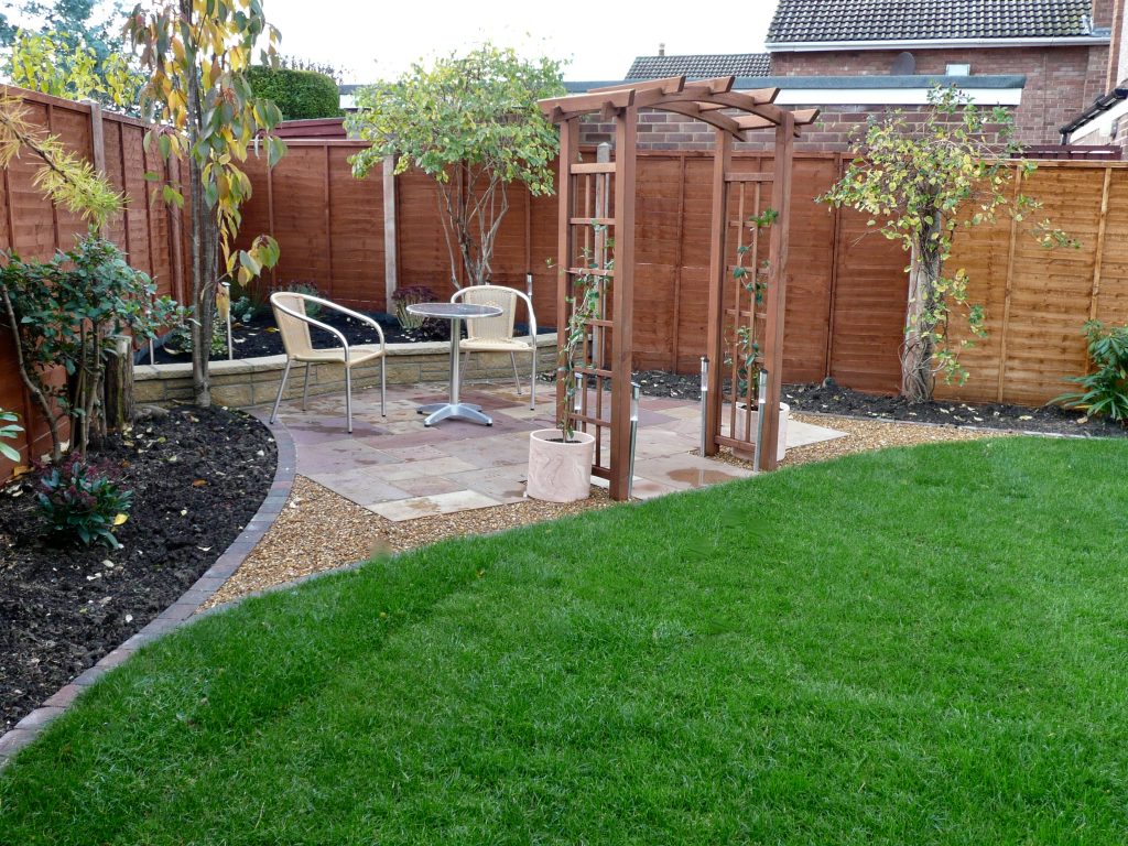 turfing, gravel,decking, walls, brick work, stockton, landscaping, Fairfield,sandstone patio, patio, curved edges, romantic garden, garden design, Darlington, Middlesbrough