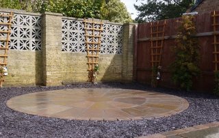 sandstone patio, 2 ring patio, sandstone,gardendesign, circular patio, purple slate, Yarm, Darlington, Green Onion Landscaping, Teesside, landscapers, landscaping, cobbled edging, planting, soft landscaping, gardens, trellis, Stockton, Wynyard, Middlesbrough, Andy Smith,