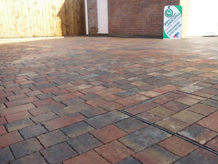 A permeable paved driveway in Hartburn. April tips for gardens, jet washed driveway. This has also been newly sealed to protect it from staining and everyday dirt. All landscaping work was carried out by Green Onion Landscaping in Hartburn Stockton Teesside County Durham. We are professional landscapers with over 30 years experience in the industry.
