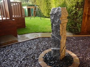 A stand alone rock water feature, this was installed by Green Onion Landscaping in a garden in Hartburn, Stockton on Tees, Teesside, County Durham.