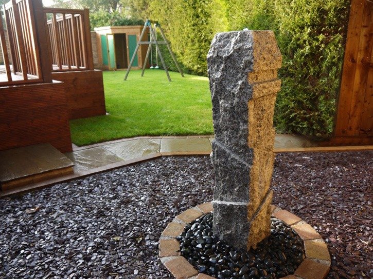 A stand alone rock water feature, this was installed by Green Onion Landscaping in a garden in Hartburn, Stockton on Tees, Teesside, County Durham.