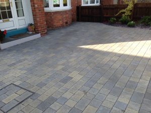 Permeable block paved driveway in grey blocks. This is in Hartburn Stockton, County Durham. Installed by Green Onion Landscaping. 