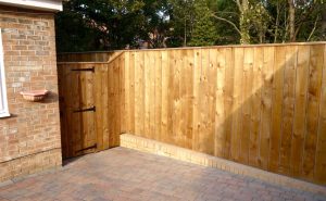 April gardening tips this photograph shows a beautiful solid close board fencing which has been installed in Hartburn Stockton on Tees along with a new permeable block paved driveway and a new garden gate. These were installed by Green Onion Landscaping who are expert garden landscapers based in Teesside County Durham