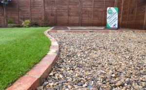 low maintenance garden, easy gardening, mobility garden design, Low maintenance garden design in Stockton-on-Tees with gravel and shrubs, Easy-care garden installation in Middlesbrough with raised beds, Minimal upkeep garden layout with water feature in Darlington, Modern low maintenance garden in Teesside with porcelain paving, raised beds for easy gardening County Durham