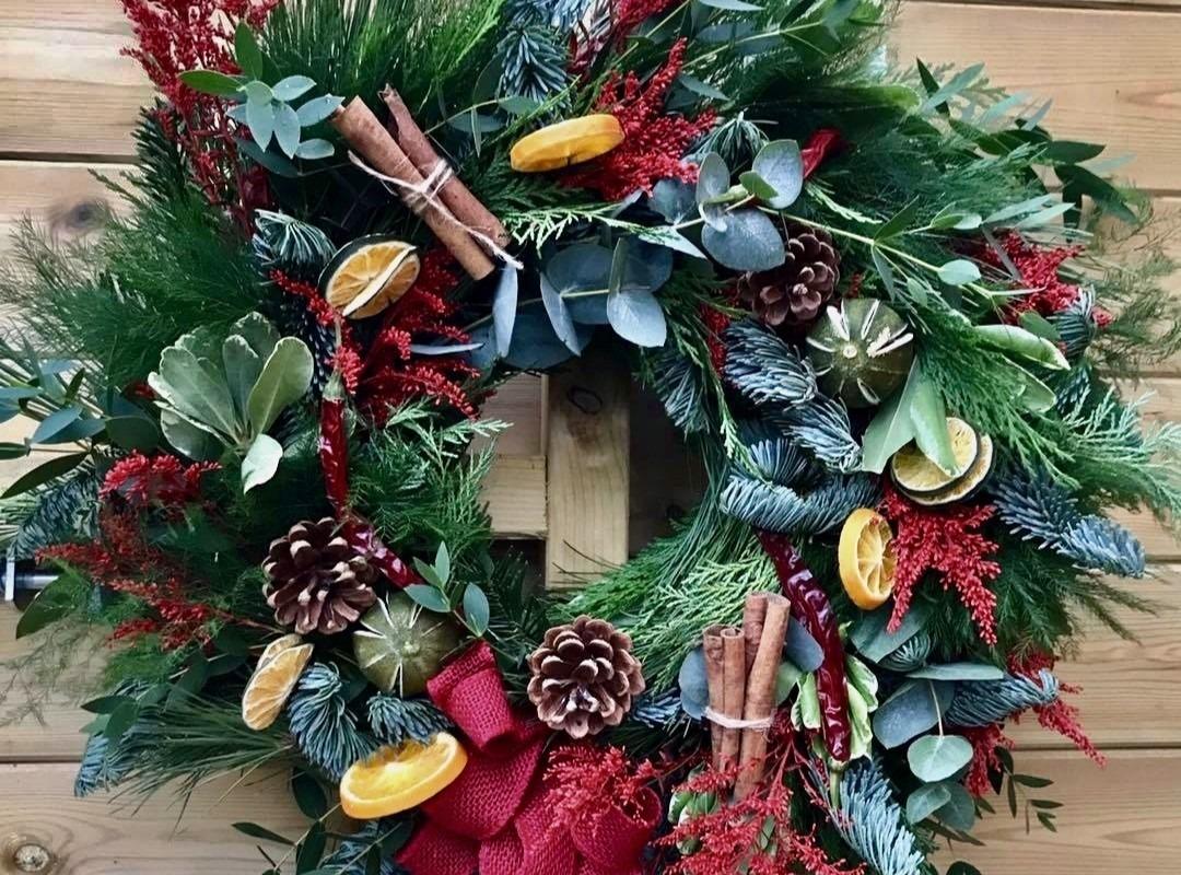 Embellished Luxury Christmas wreath with gorgeous large red bow handmade locally in Hartburn by Green Onion Landscaping Stockton on Tees